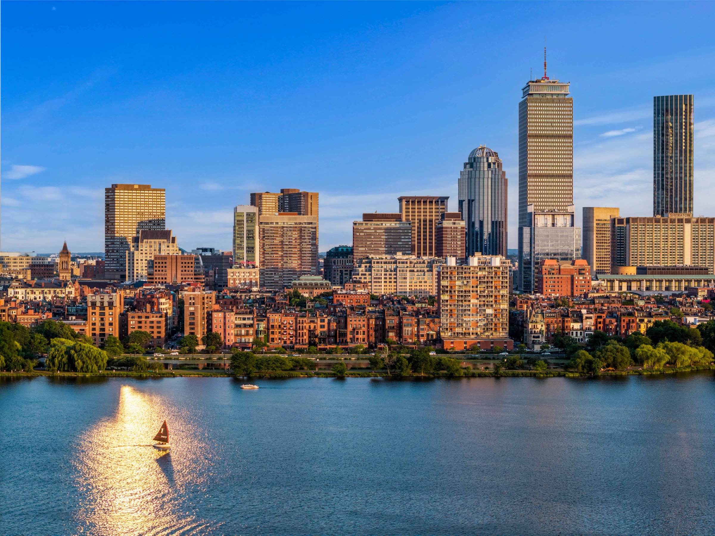 Back Bay skyline and brownstones beside the Charles River
